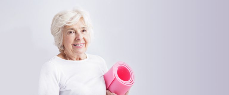 Mature elderly woman doing physiotherapy